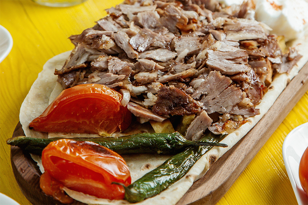 side view beef doner kebab plate with grilled vegetables